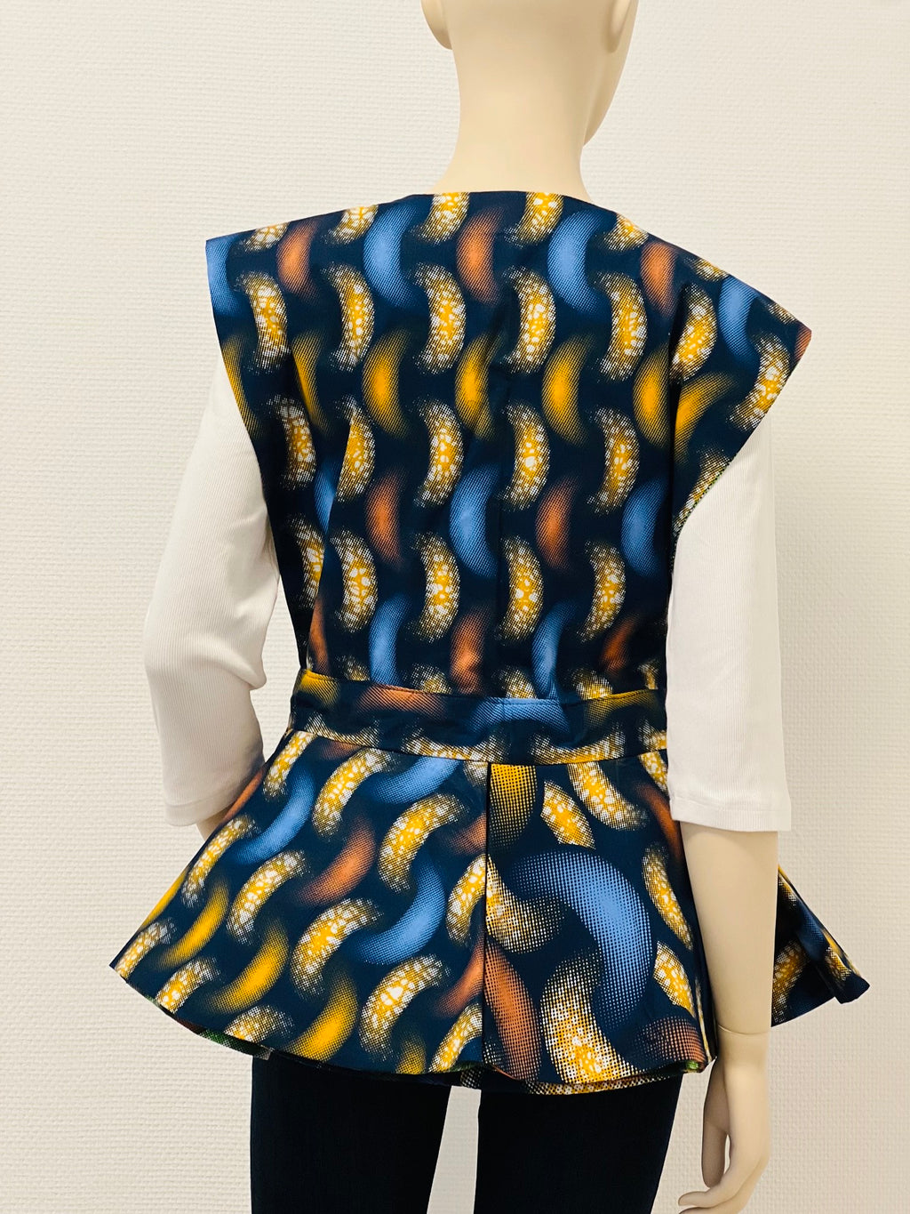 All-Season Reversible Peplum Vest