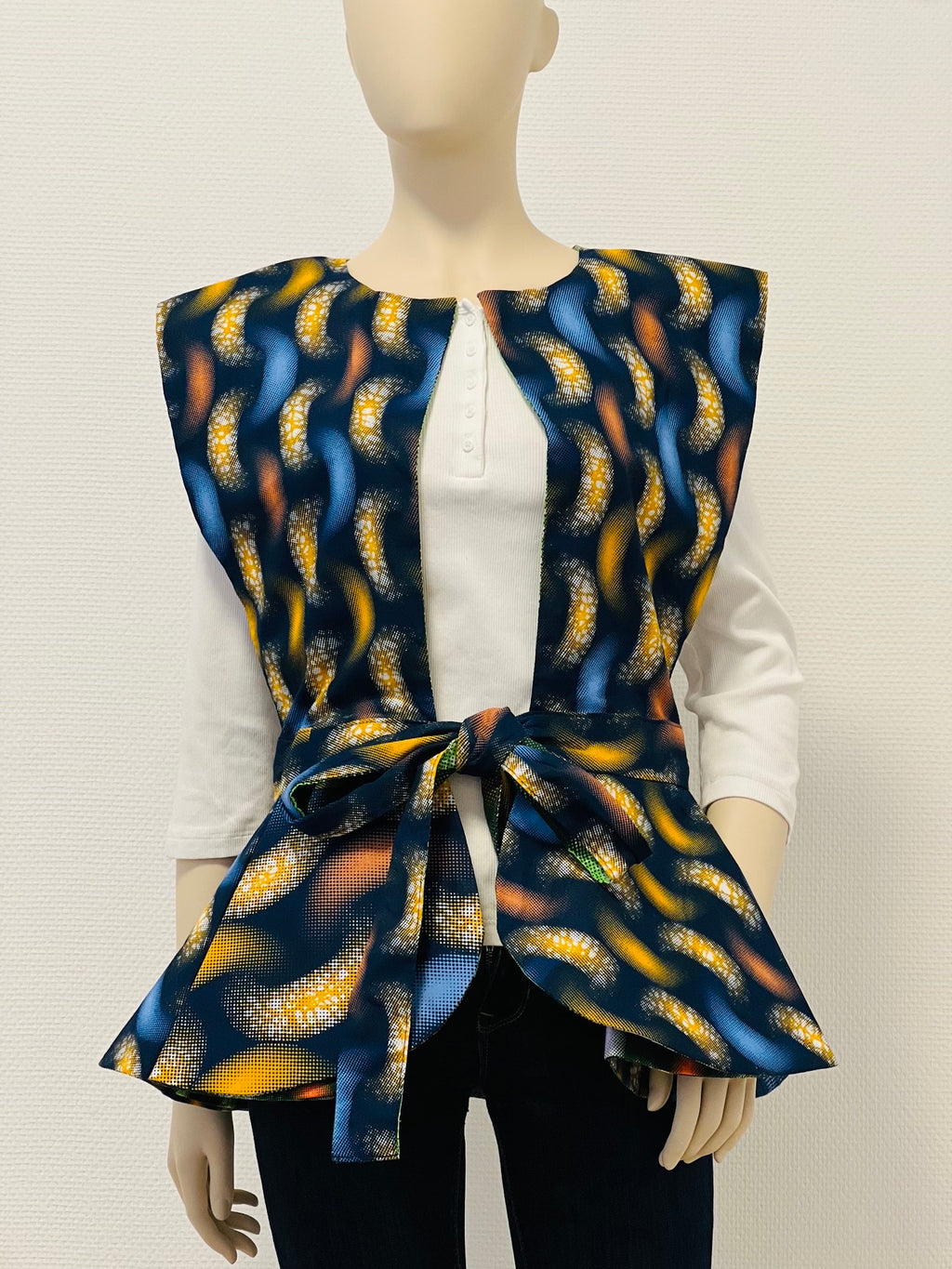 All-Season Reversible Peplum Vest