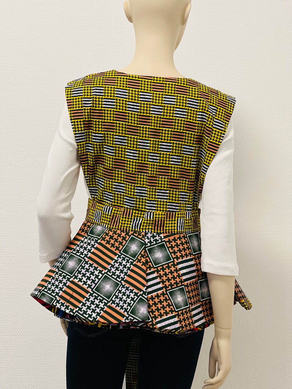 All-Season Reversible Peplum Vest