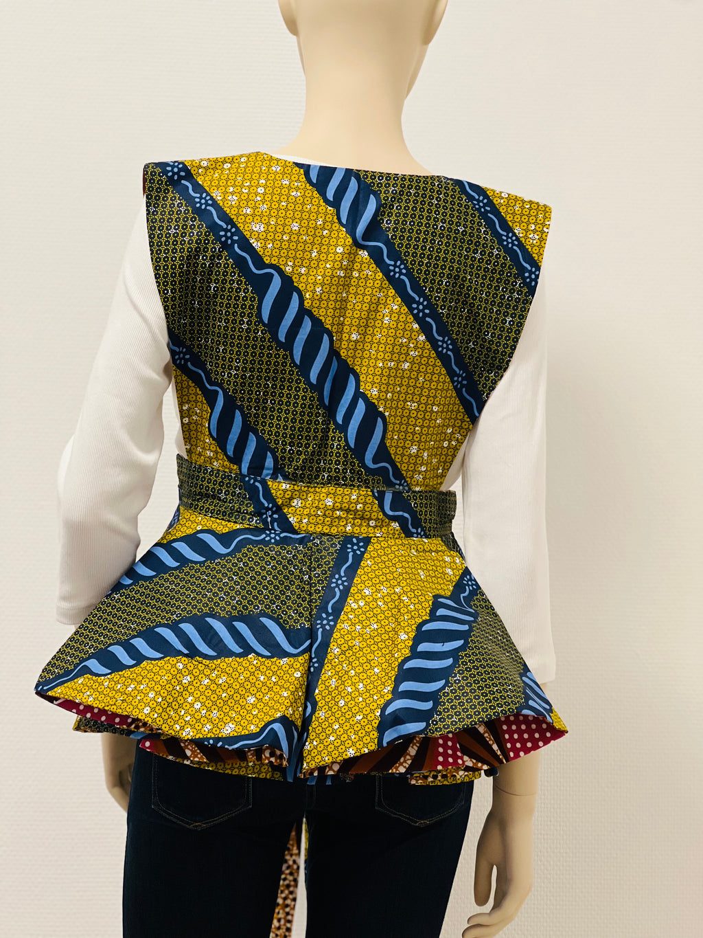 All-Season Reversible Peplum Vest