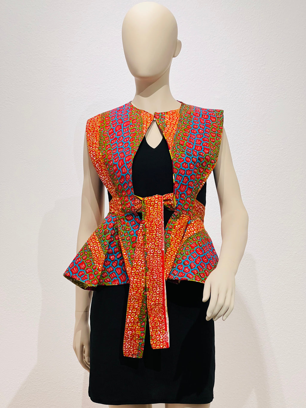 All-Season Reversible Peplum Vest