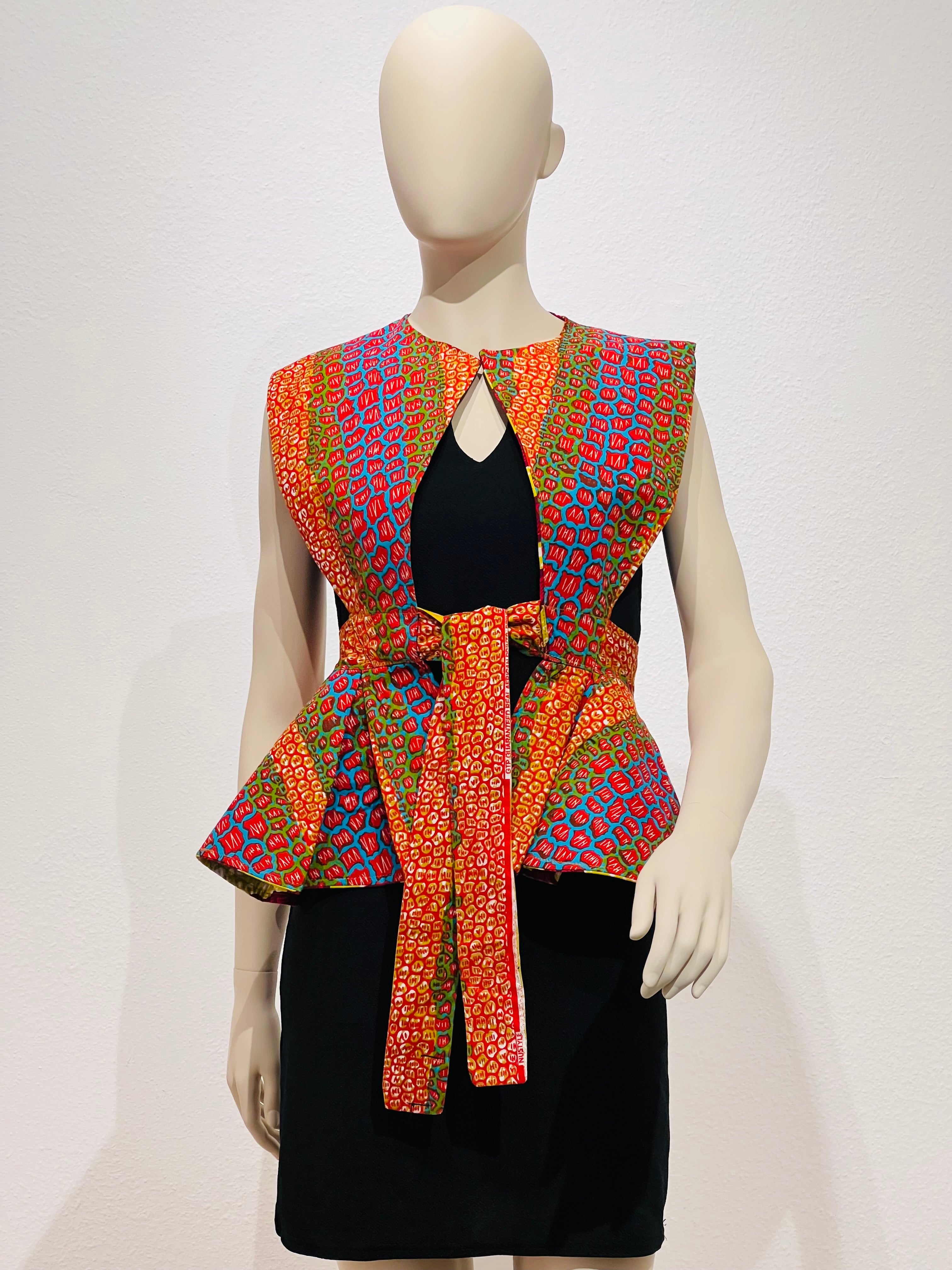 All-Season Reversible Peplum Vest