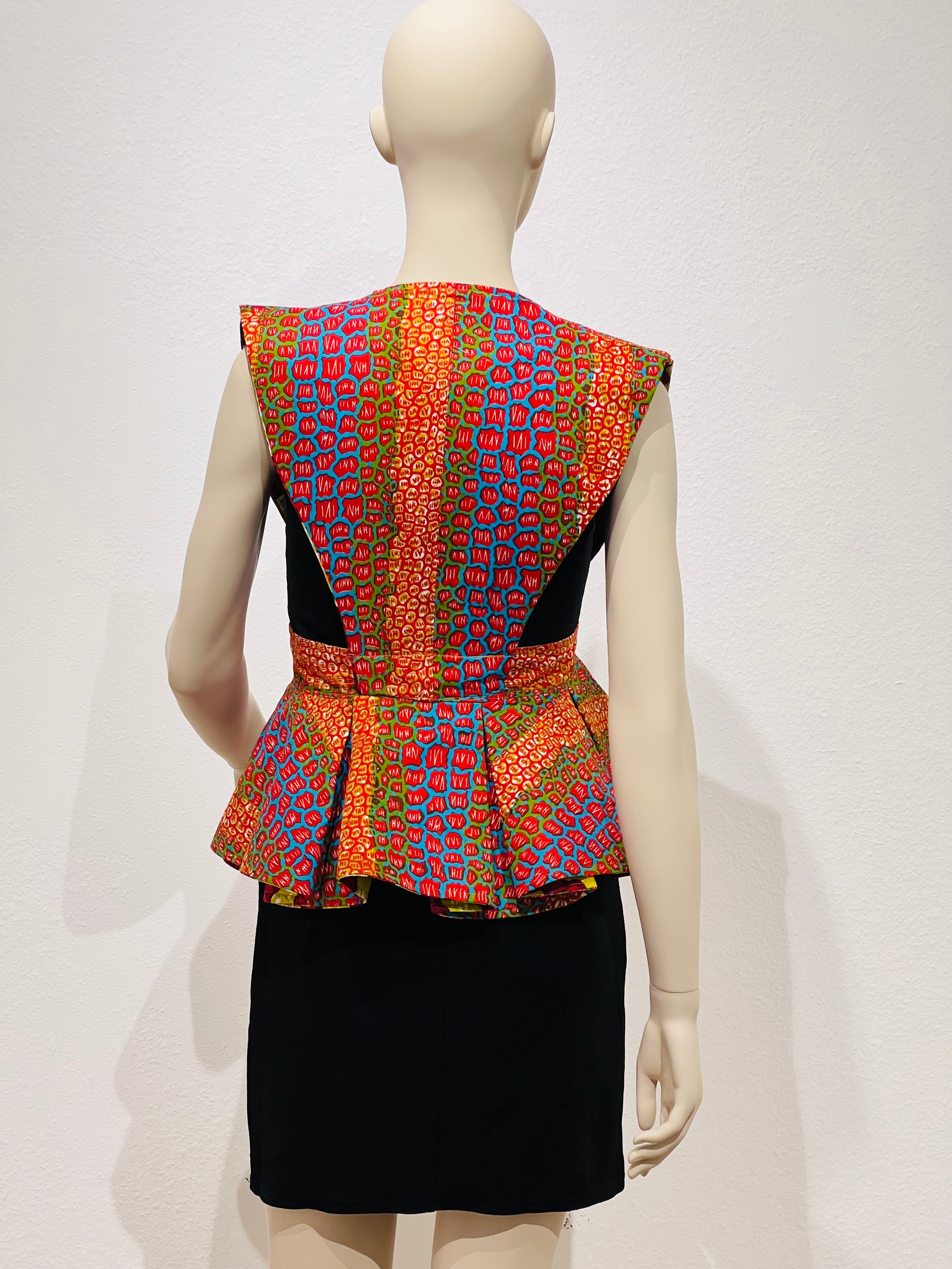 All-Season Reversible Peplum Vest