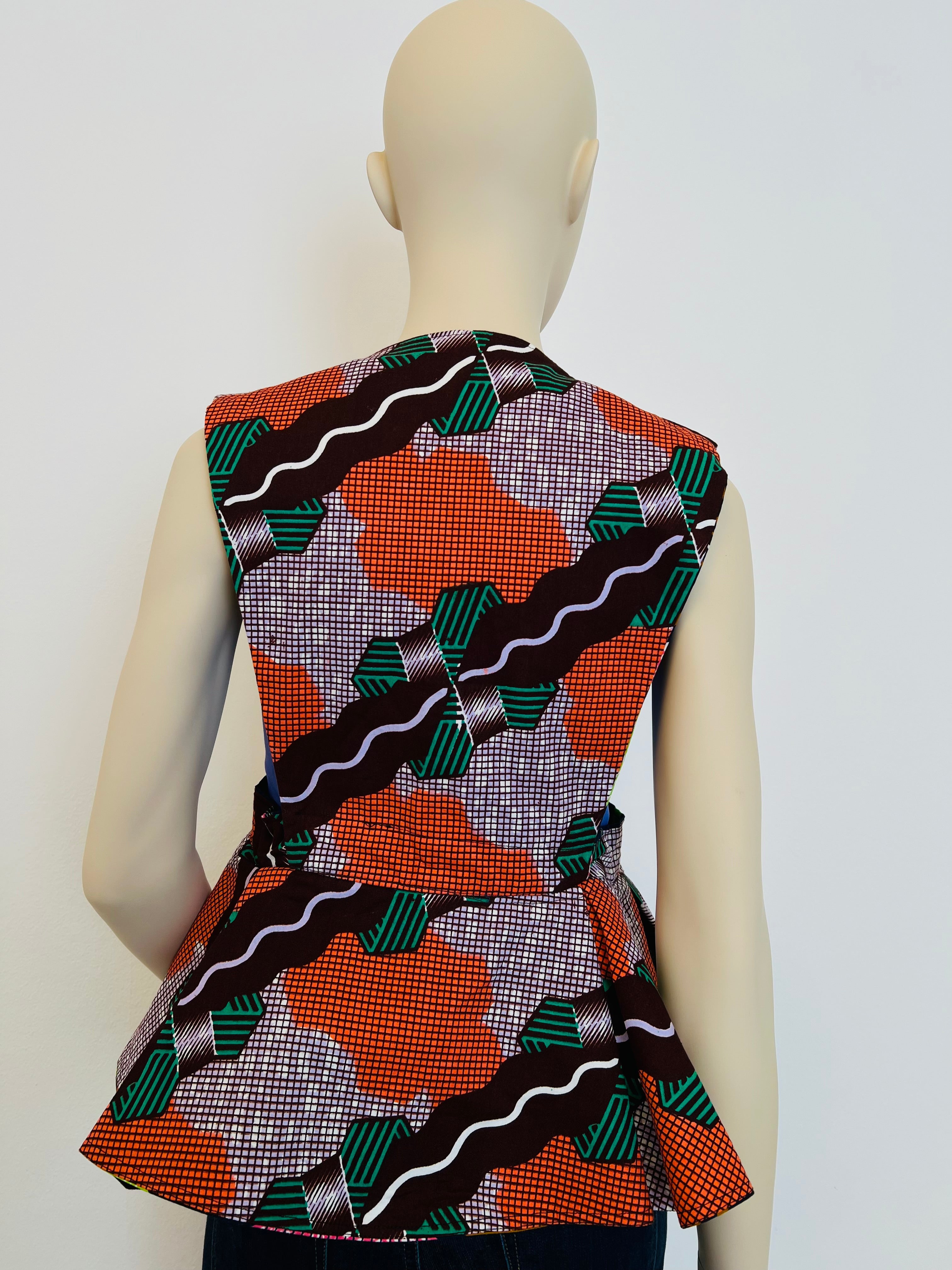 All-Season Reversible Peplum Vest