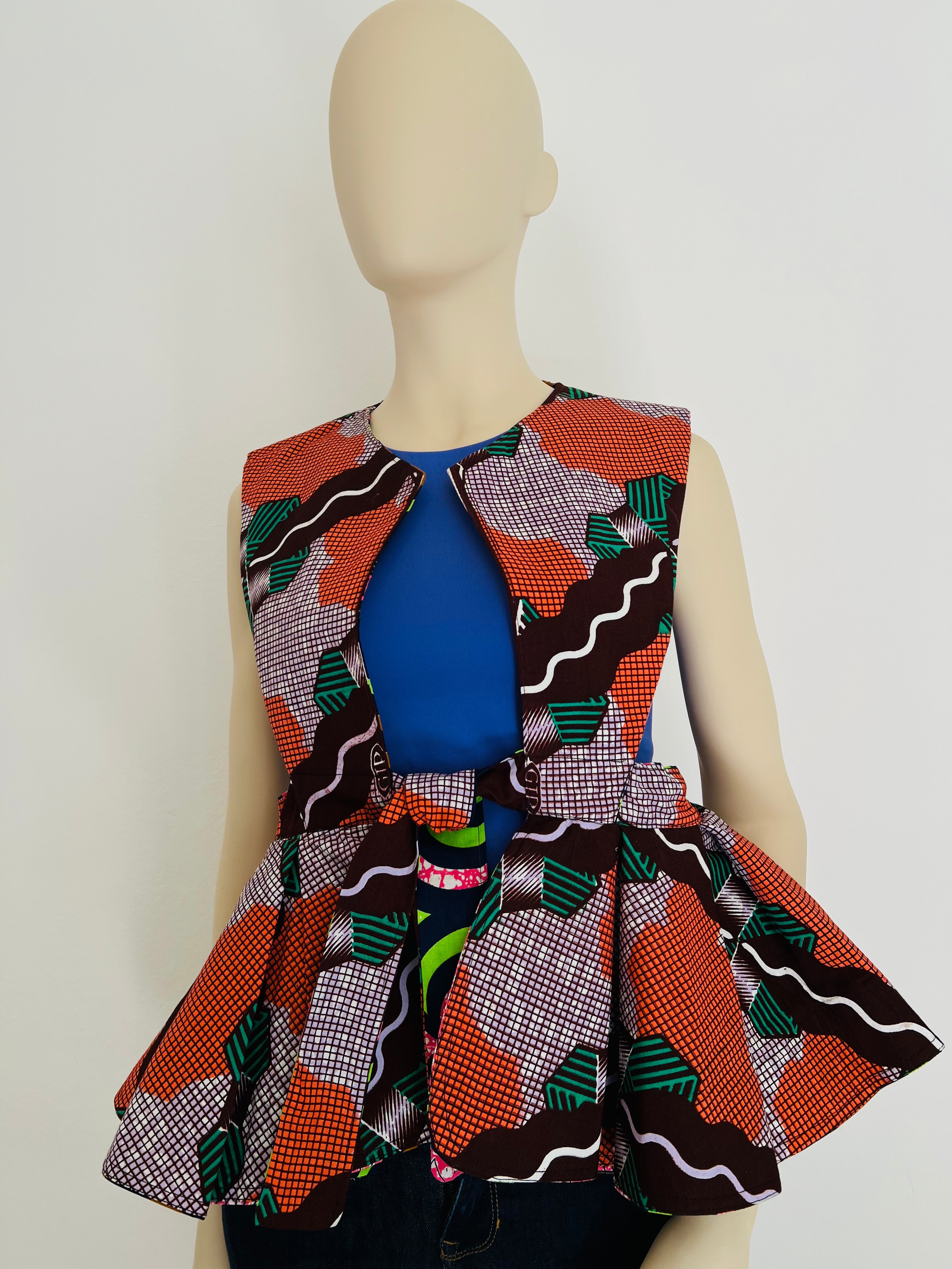 All-Season Reversible Peplum Vest