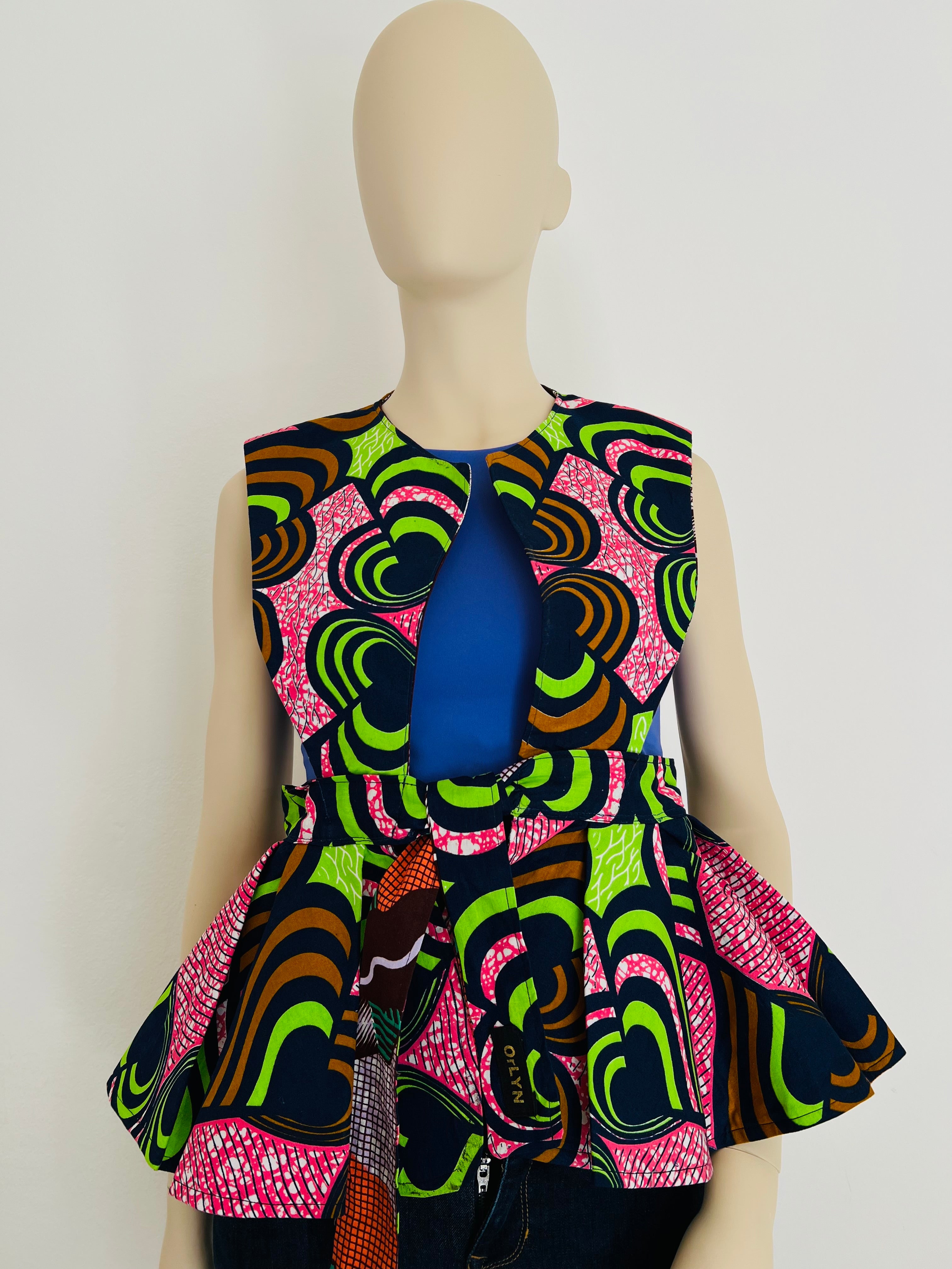 All-Season Reversible Peplum Vest