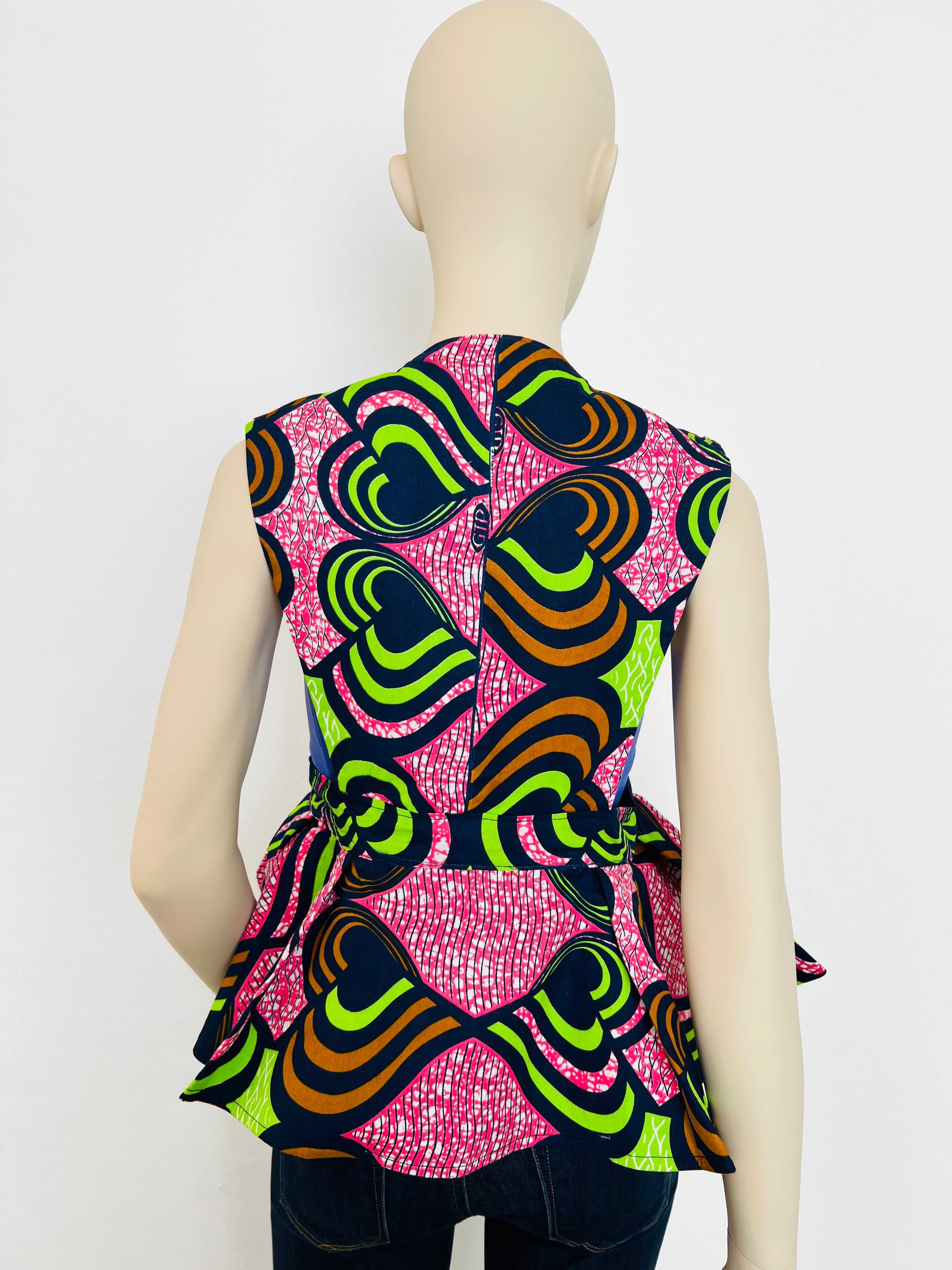 All-Season Reversible Peplum Vest