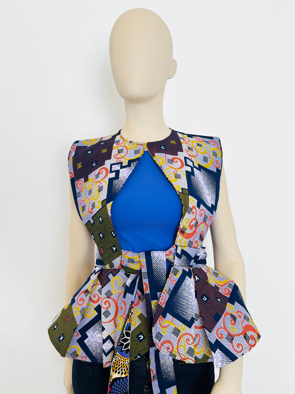 All-Season Reversible Peplum Vest