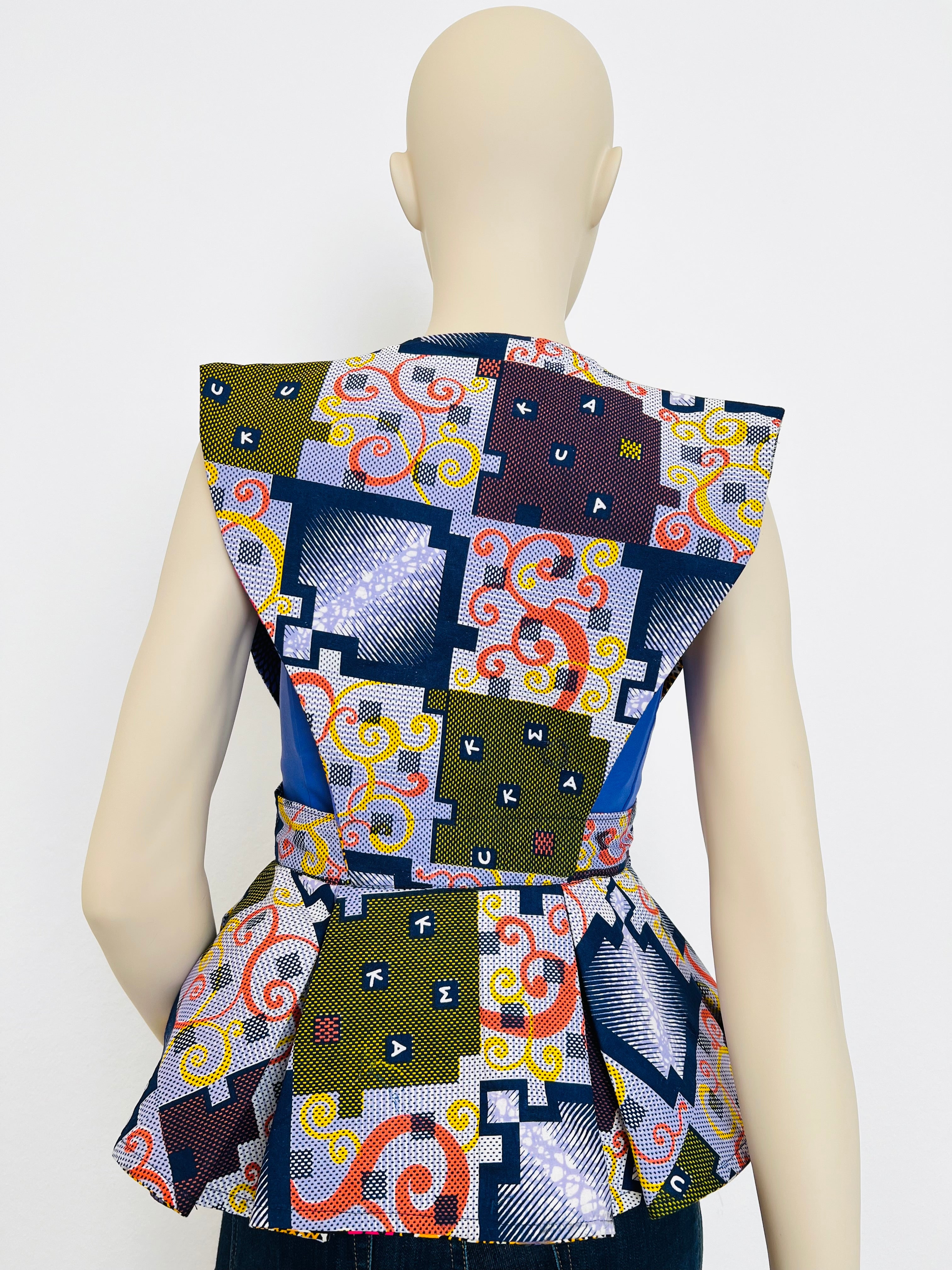 All-Season Reversible Peplum Vest