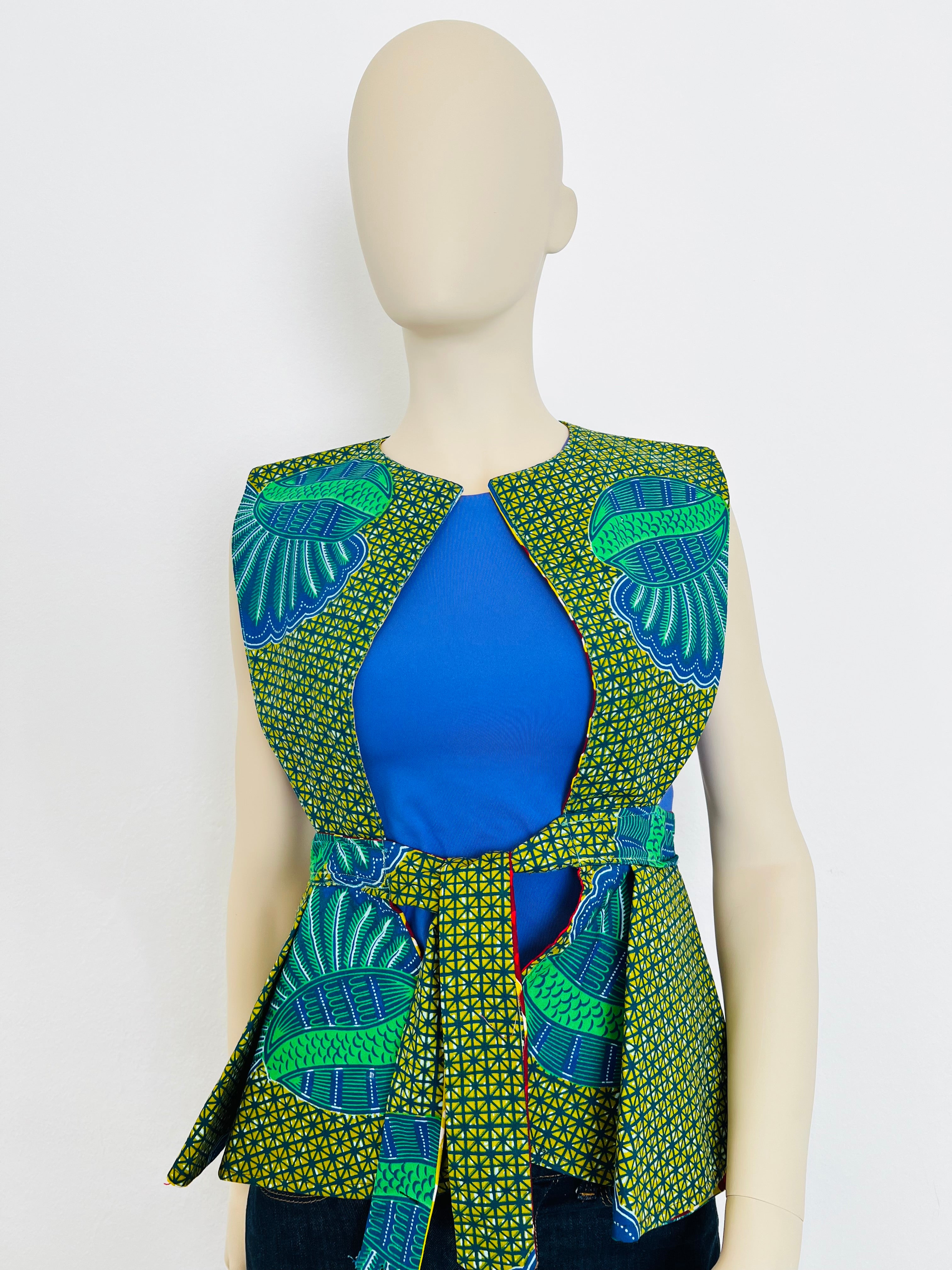 All-Season Reversible Peplum Vest