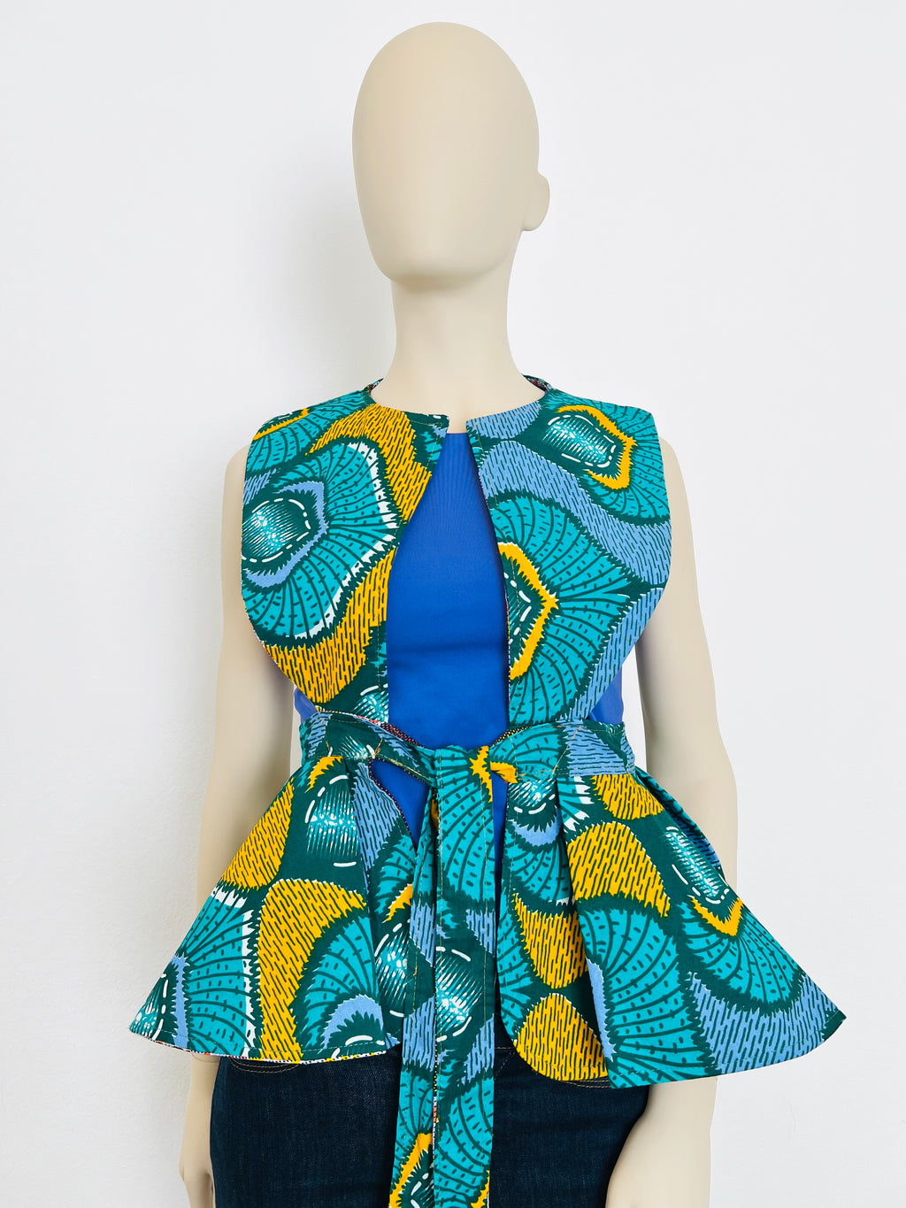 All-Season Reversible Peplum Vest