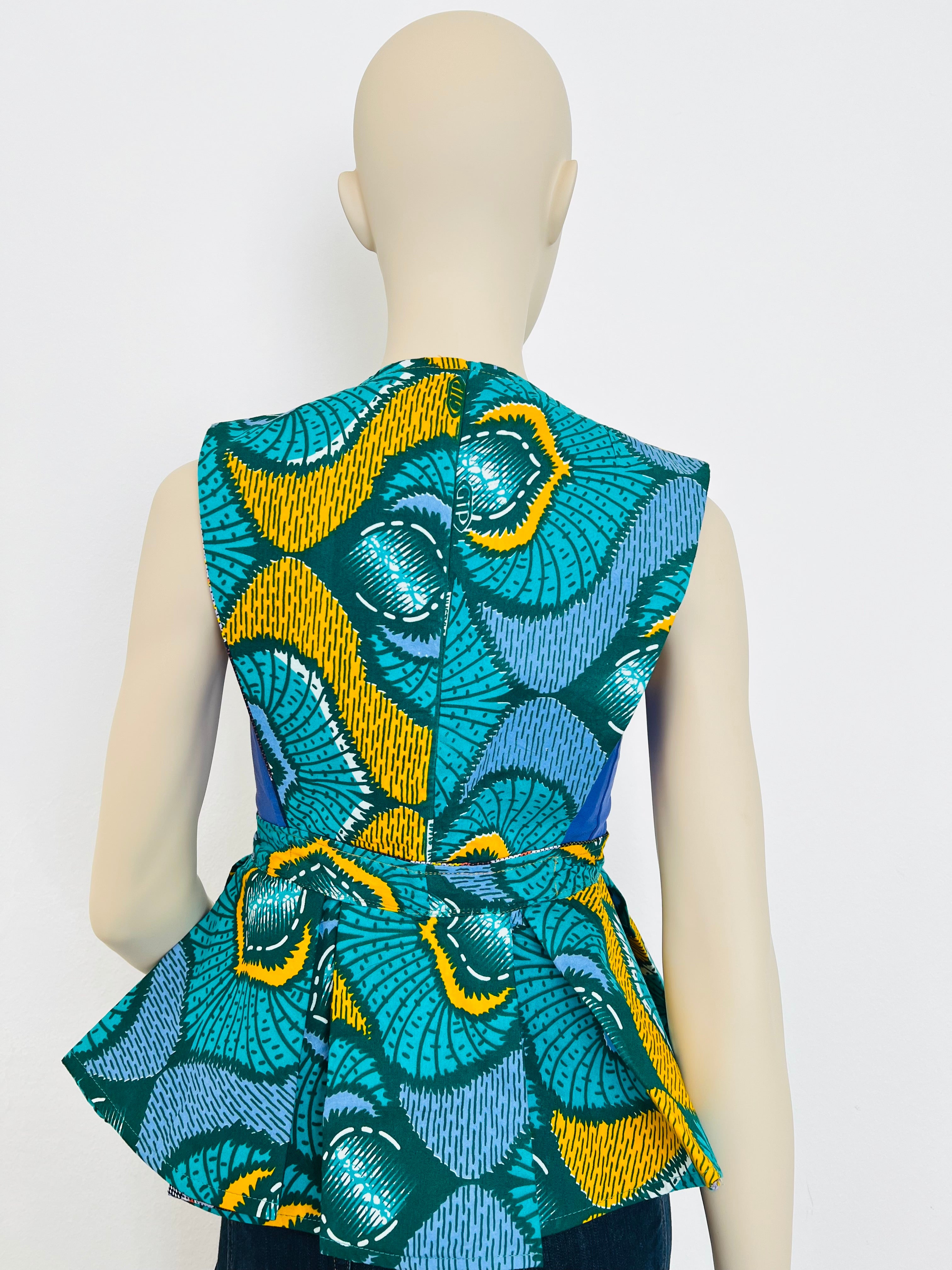 All-Season Reversible Peplum Vest
